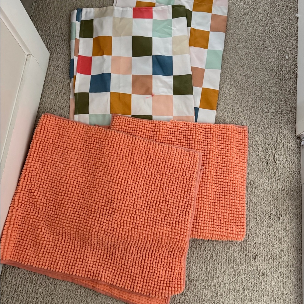 Colorful Checkered shower curtain and Orange floor rugs